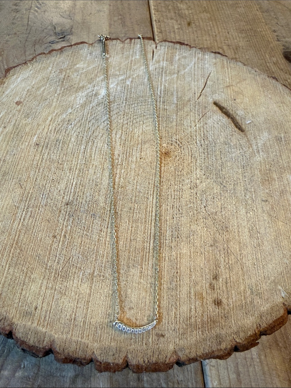 Kendra Scott Gold Curved Bar Necklace with Clear Stones